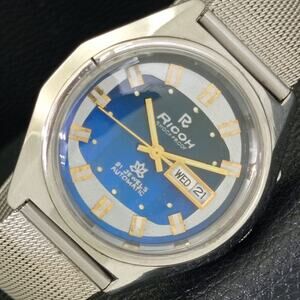 Vintage 1986 Ricoh Automatic Mens Silver Watch W/daydate & Blue accents